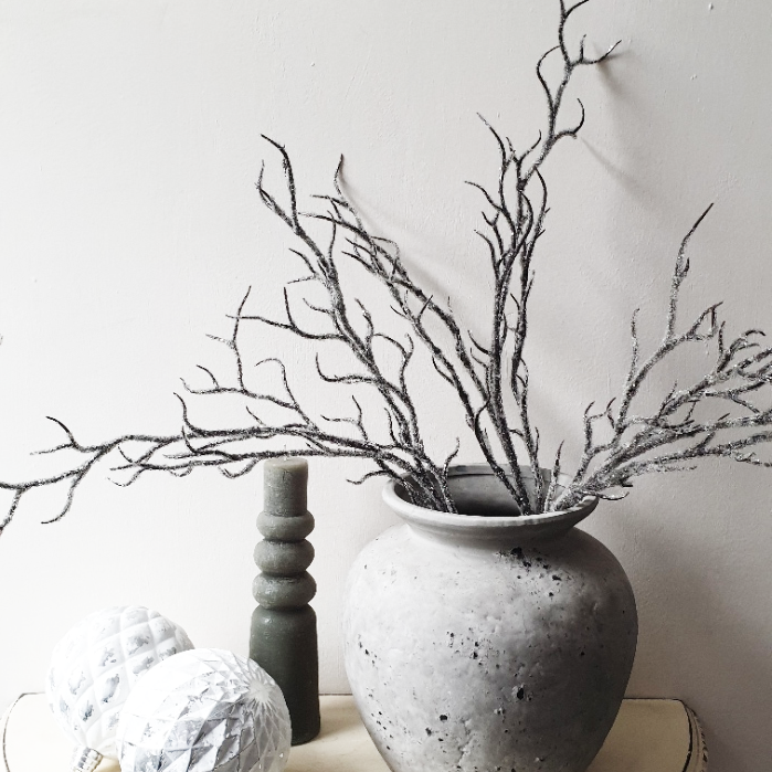 wedding flowers Cheshire - Gray textured vase with dried branches on a light background