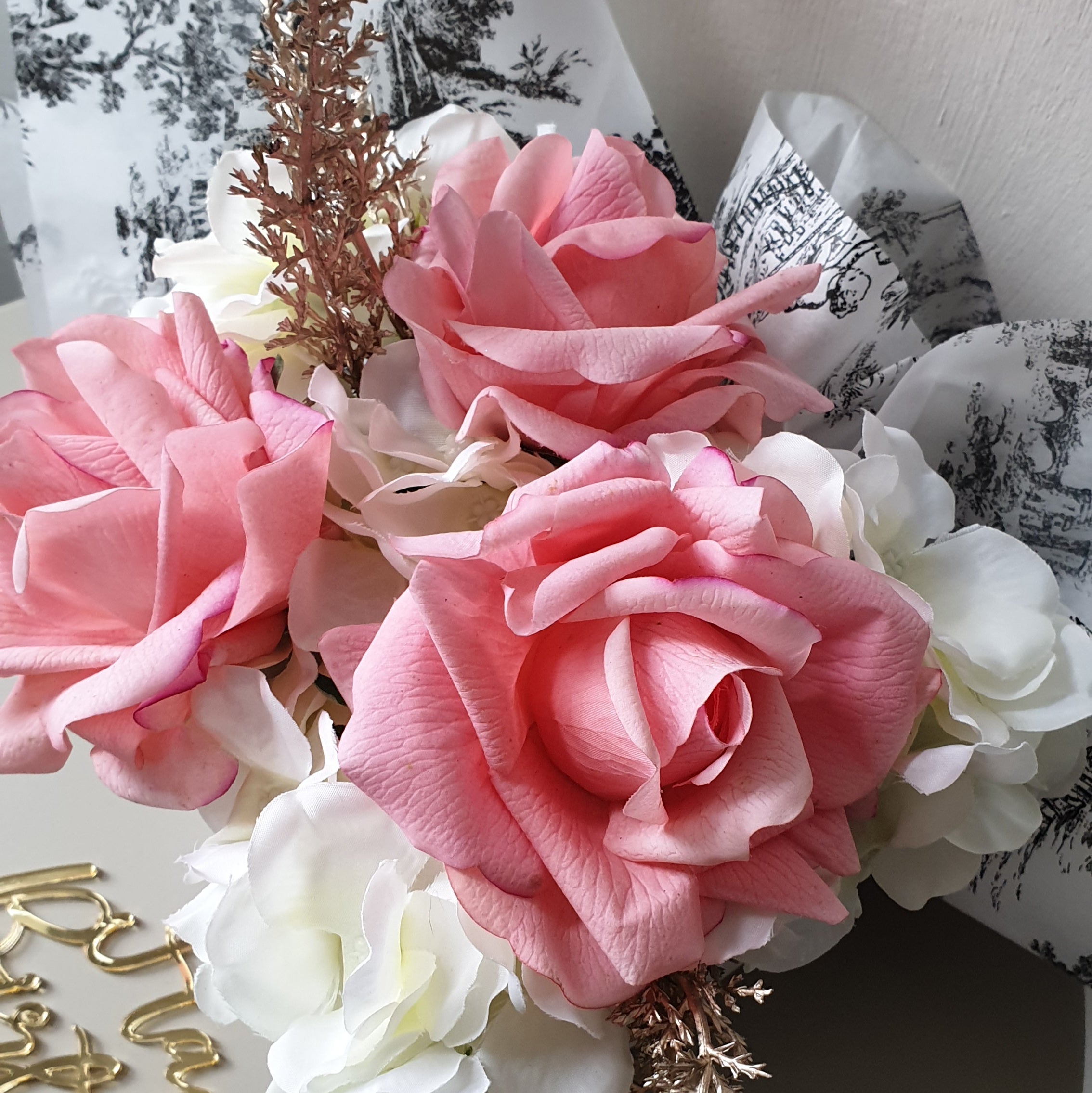artificial wedding flowers - Close-up of pink and white flowers with a blurred background